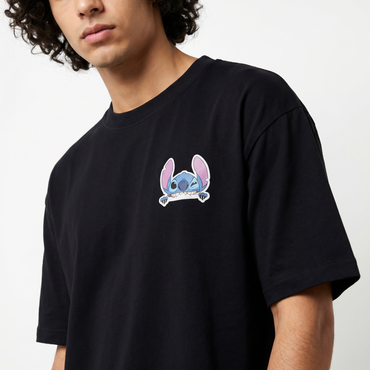 Stitch “Eat Sleep Play Repeat” Oversized Tee – Black Edition